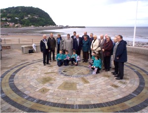 Local dignitaries and school children gather for a photograph
